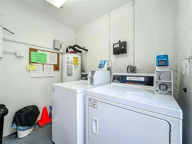 a utility room with dryer and washer