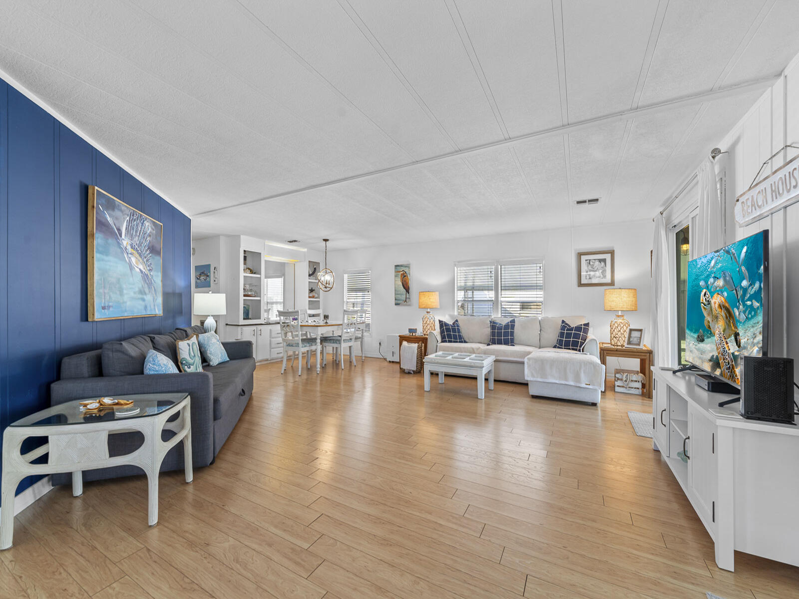 806 South Jade Drive Key Largo, FL 33037 - Photo 1 of 37 a living room with furniture and a flat screen tv