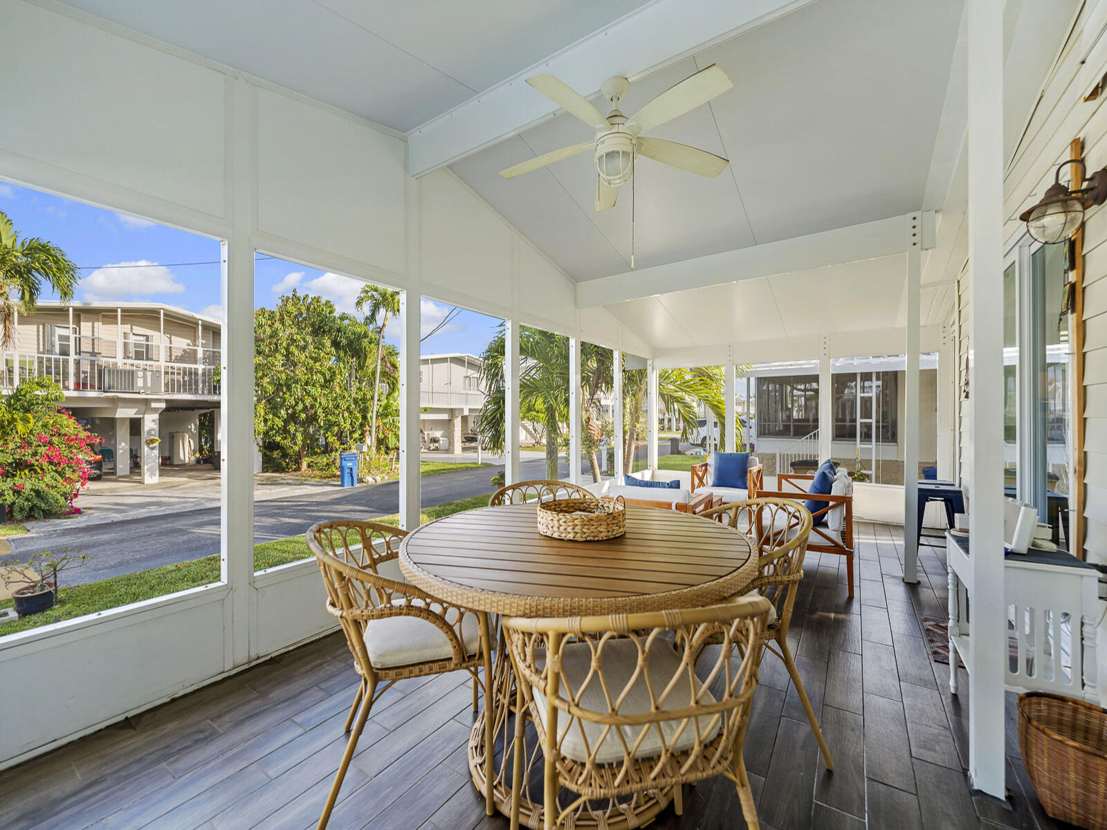 806 South Jade Drive Key Largo, FL 33037 - Photo 17 of 37 a view of a dining room with furniture window and wooden floor