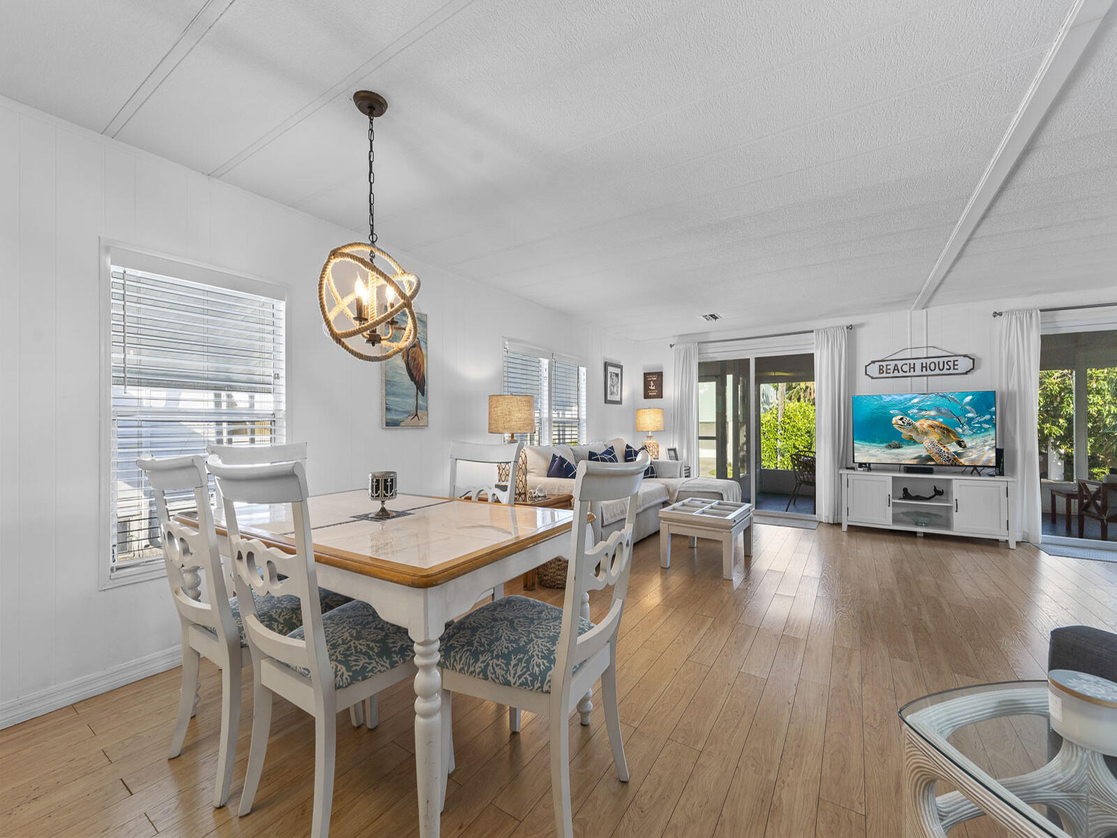 806 South Jade Drive Key Largo, FL 33037 - Photo 27 of 37 a view of a dining room with furniture window and wooden floor