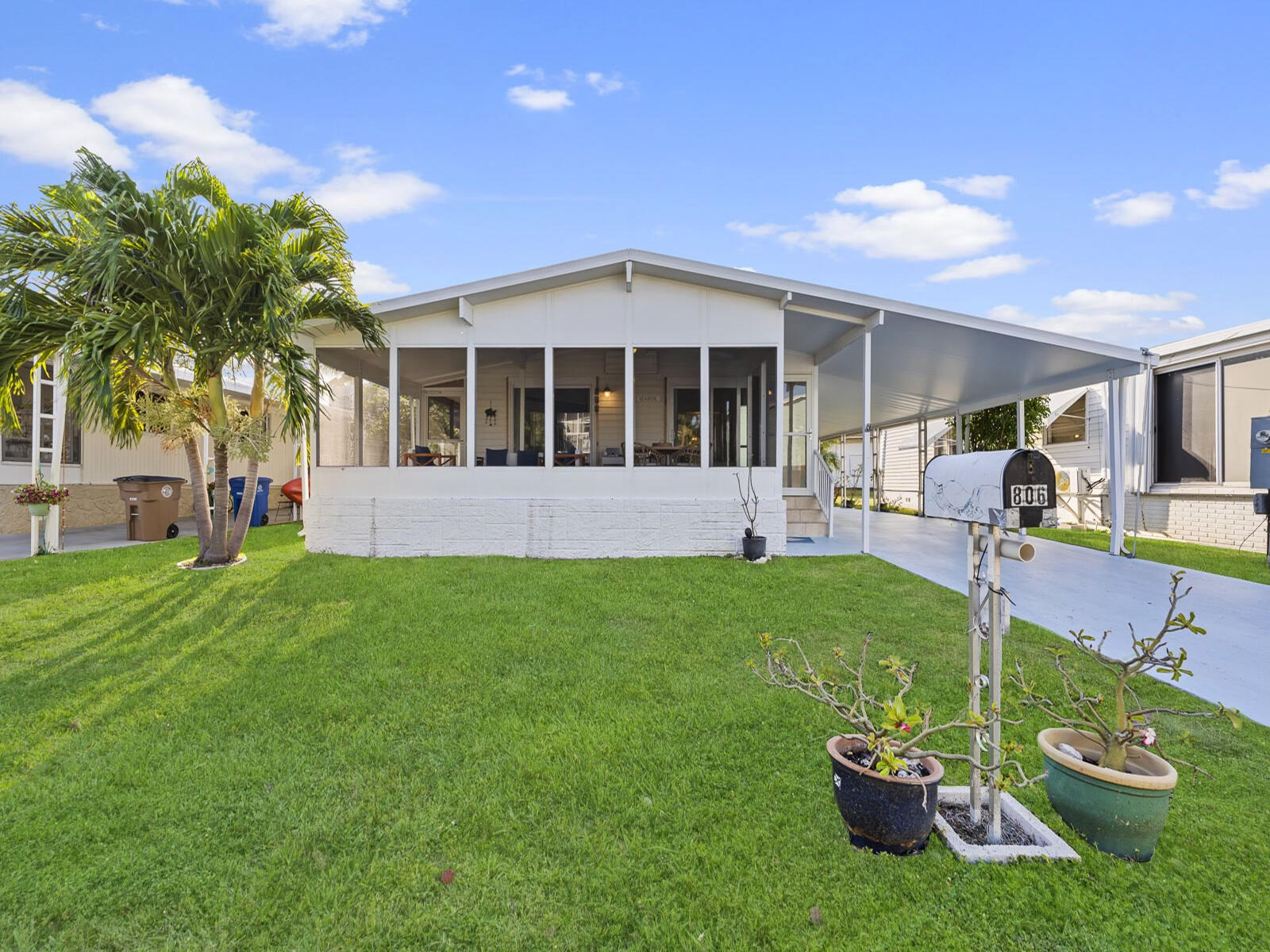 806 South Jade Drive Key Largo, FL 33037 - Photo 29 of 37 a view of a house with backyard porch and sitting area