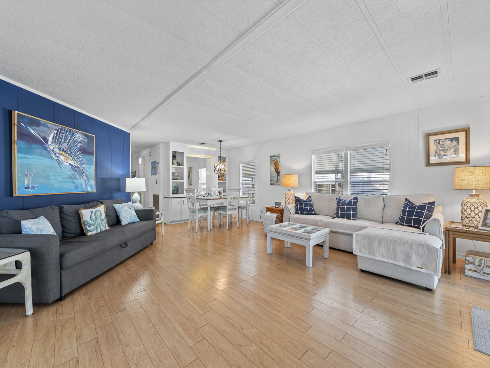 806 South Jade Drive Key Largo, FL 33037 - Photo 3 of 37 a living room with furniture and a wooden floor