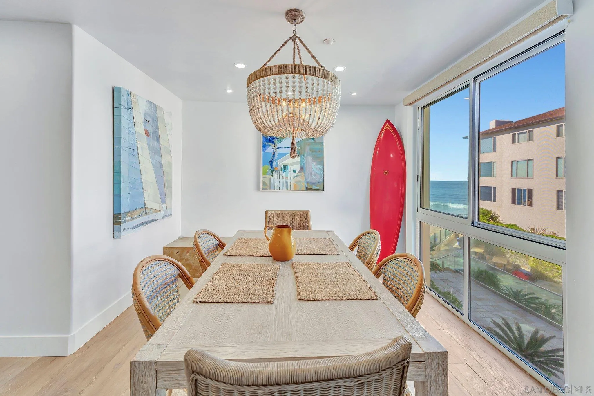 202 Coast Boulevard, Unit 8 La Jolla, CA 92037 - Photo 9 of 24 a view of a dining room with furniture