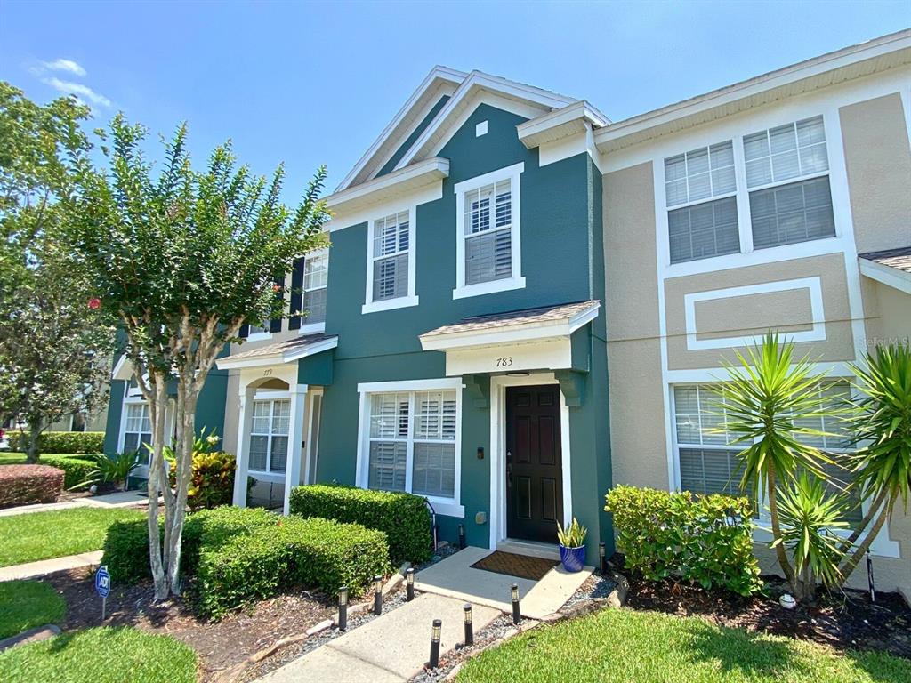 783 Shropshire Loop Sanford, FL 32771 - Photo 1 of 1 a front view of a house with a yard