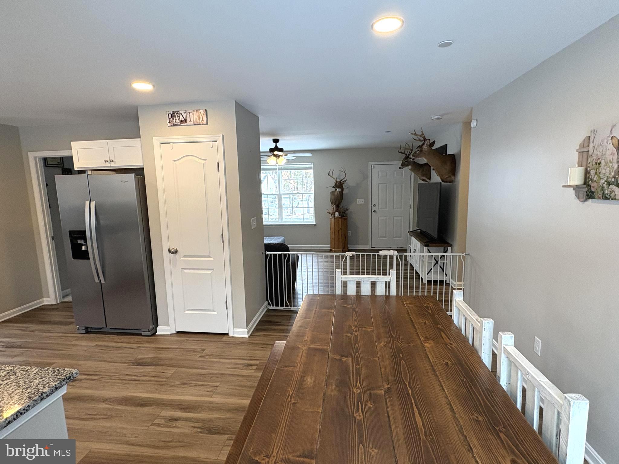 148 East Step Road Chestertown, MD 21620 - Photo 11 of 46 a view of a hallway view with wooden floor and staircase