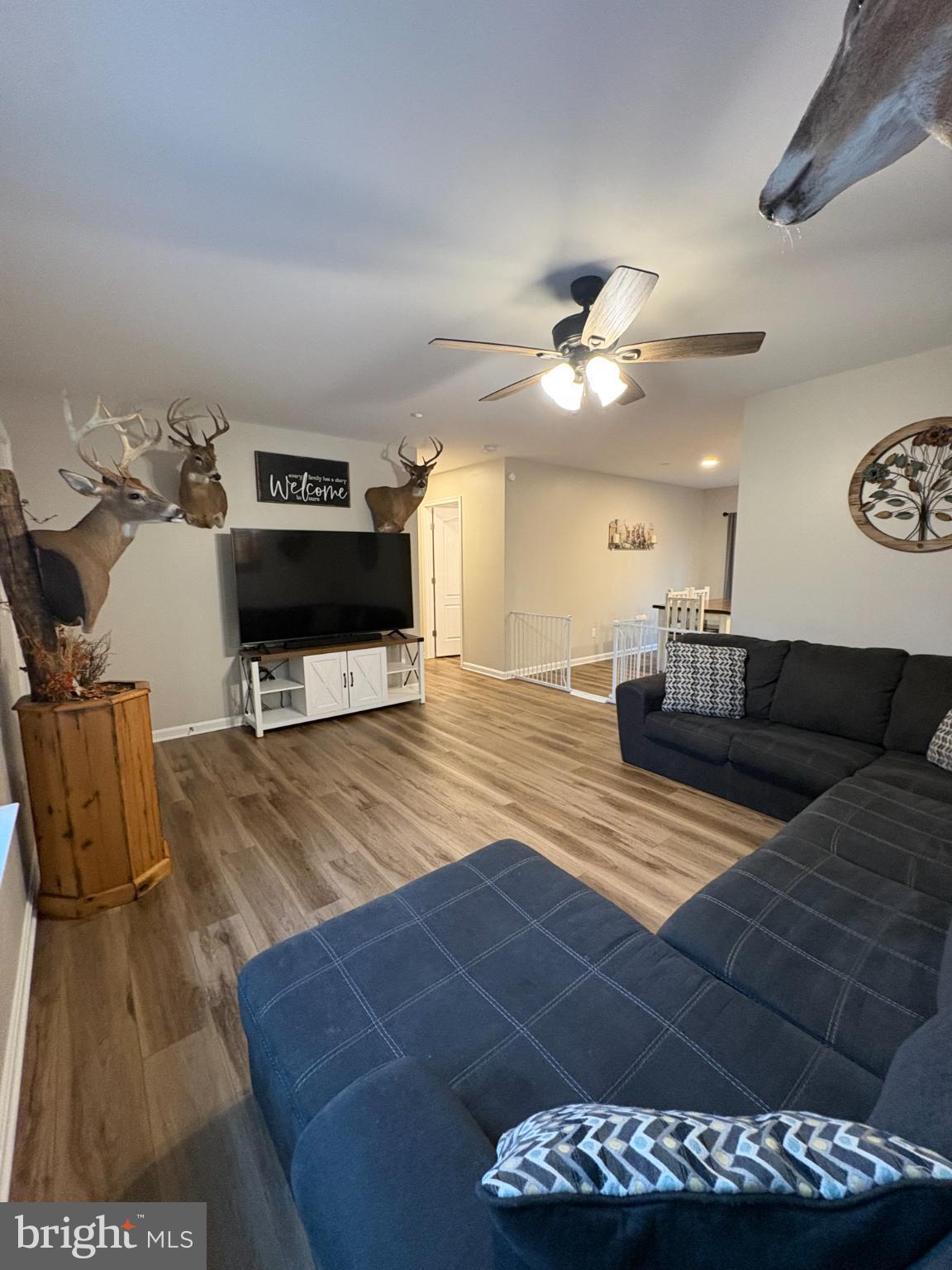 148 East Step Road Chestertown, MD 21620 - Photo 14 of 46 a living room with furniture and a wooden floor