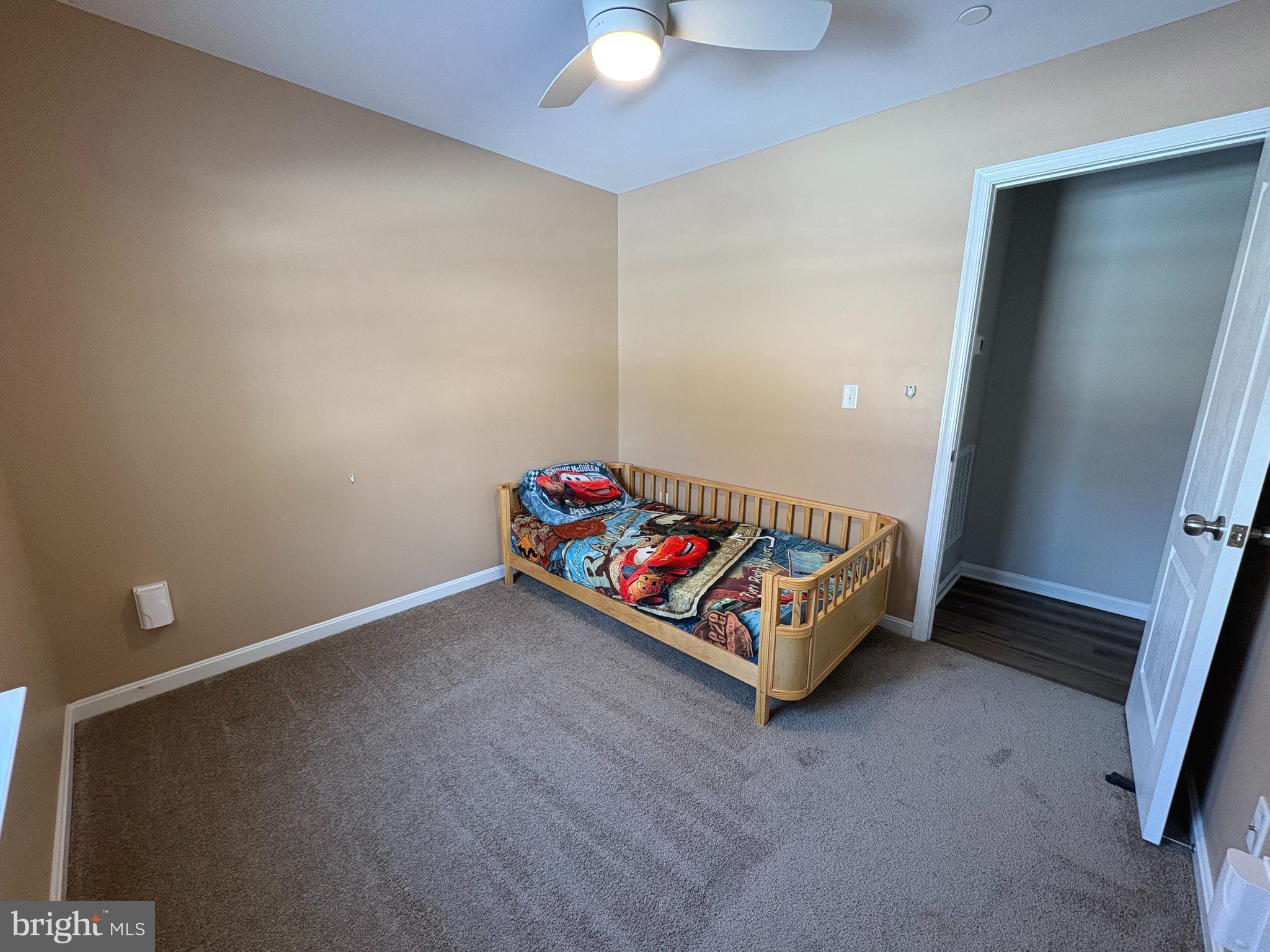 148 East Step Road Chestertown, MD 21620 - Photo 17 of 46 a bed room with a bed and a couch