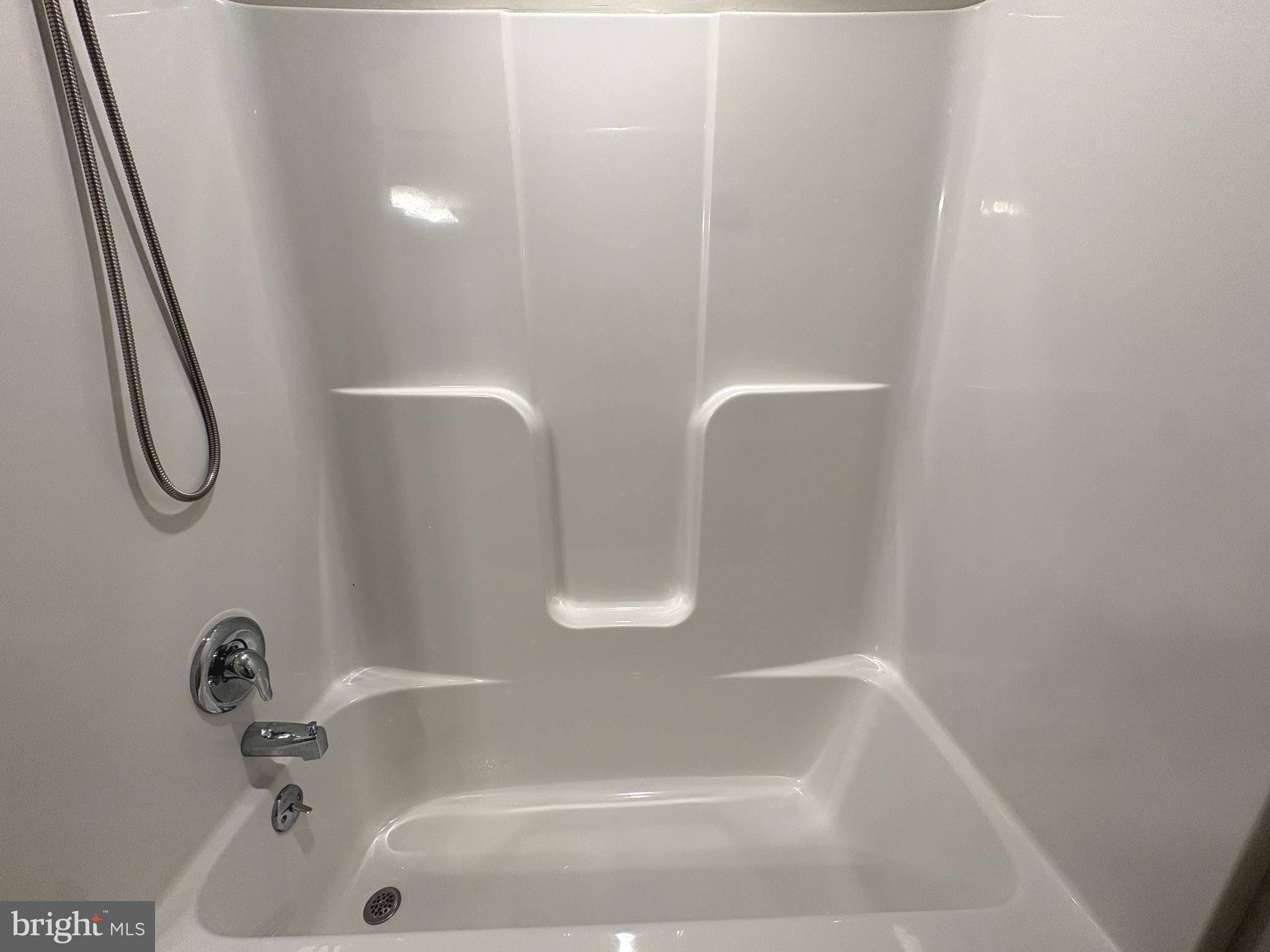 148 East Step Road Chestertown, MD 21620 - Photo 22 of 46 a bathroom with a tub