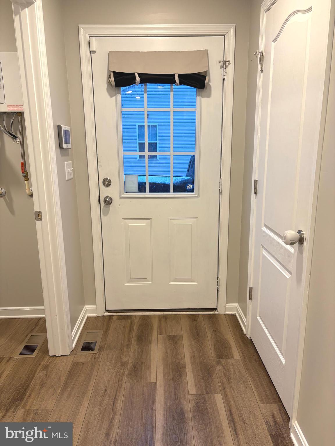148 East Step Road Chestertown, MD 21620 - Photo 3 of 46 a view of front door with wooden floor