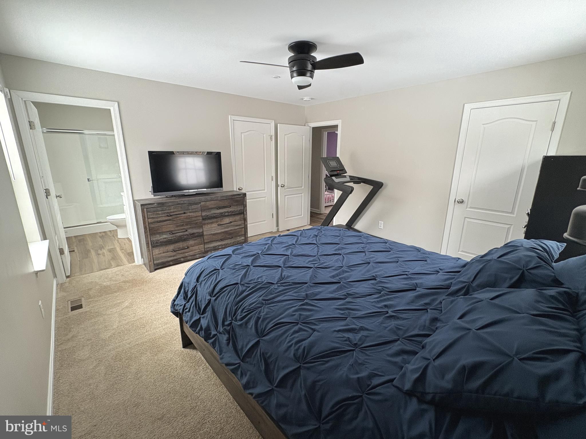 148 East Step Road Chestertown, MD 21620 - Photo 31 of 46 a bedroom with a bed and a flat screen tv