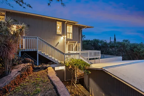a view of a balcony with chairs