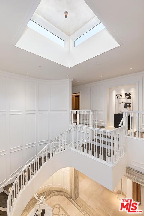 610 North Rodeo Drive Beverly Hills, CA 90210 - Photo 16 of 38 a view of an entryway wooden deck