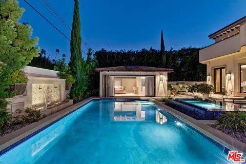 a view of a kitchen with swimming pool