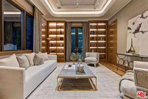 a living room with furniture and window