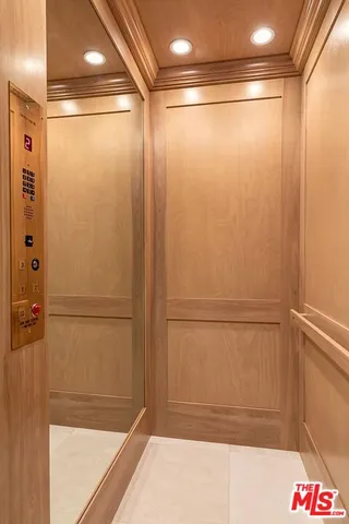 a bathroom with a shower and a sink