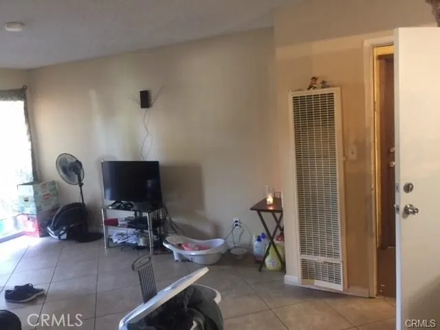 a view of a dining room with furniture and window