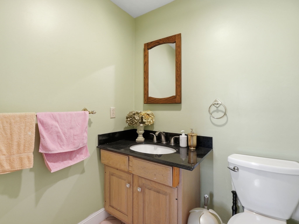 90 Blue Ridge Road North Andover, MA 01845 - Photo 11 of 26 a bathroom with a granite countertop sink and a vanity