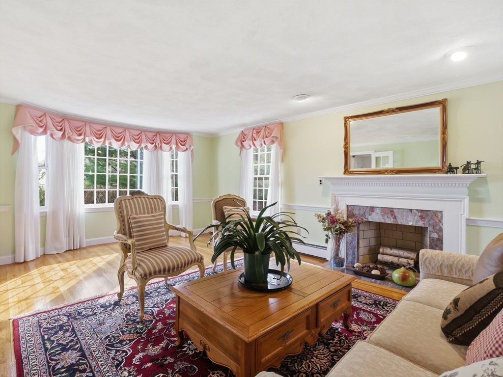 90 Blue Ridge Road North Andover, MA 01845 - Photo 12 of 26 a living room with furniture and a fireplace