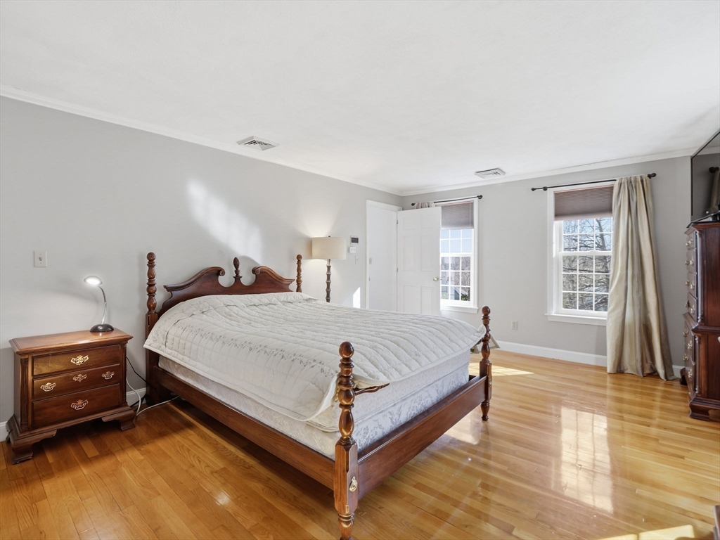 90 Blue Ridge Road North Andover, MA 01845 - Photo 17 of 26 a bed room with a bed and a window