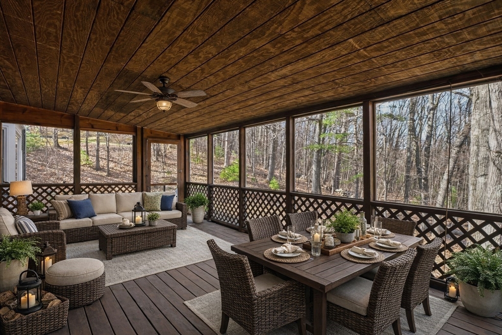 90 Blue Ridge Road North Andover, MA 01845 - Photo 23 of 26 a dining room with furniture wooden floor and a chandelier