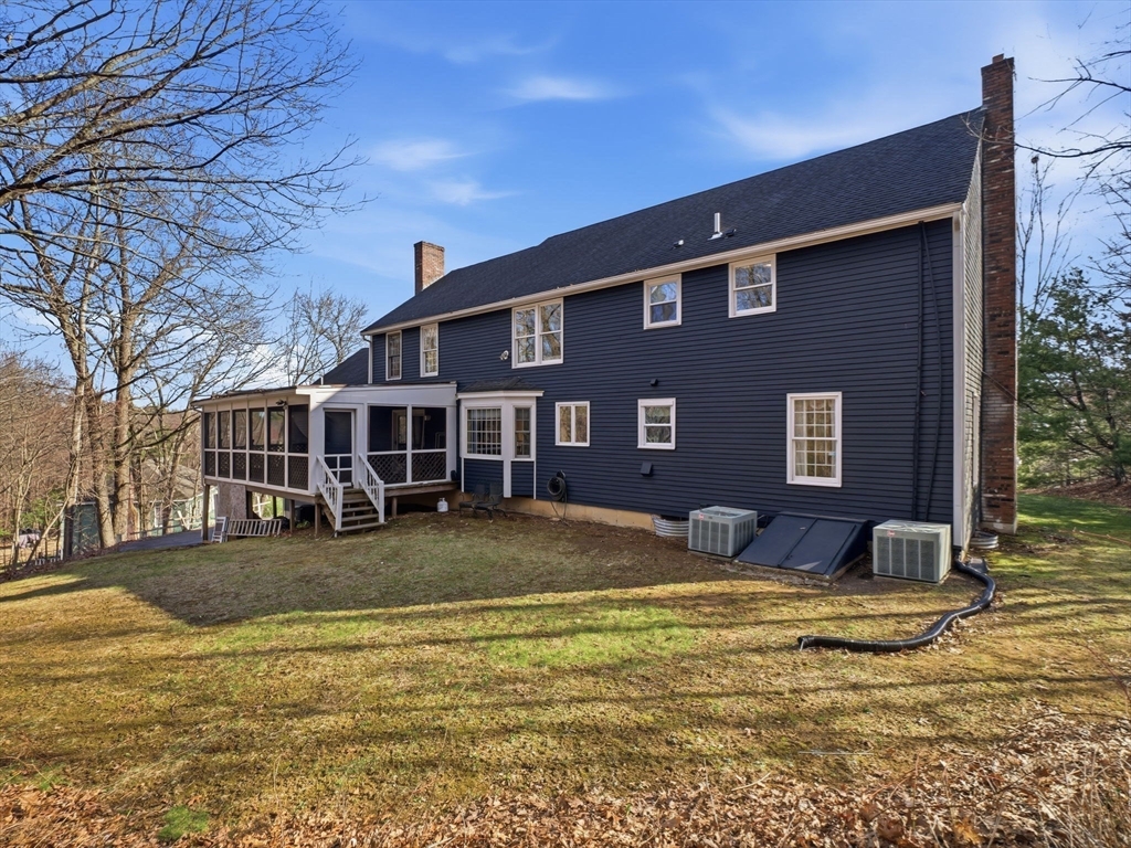 90 Blue Ridge Road North Andover, MA 01845 - Photo 26 of 26 a front view of a house with swimming pool