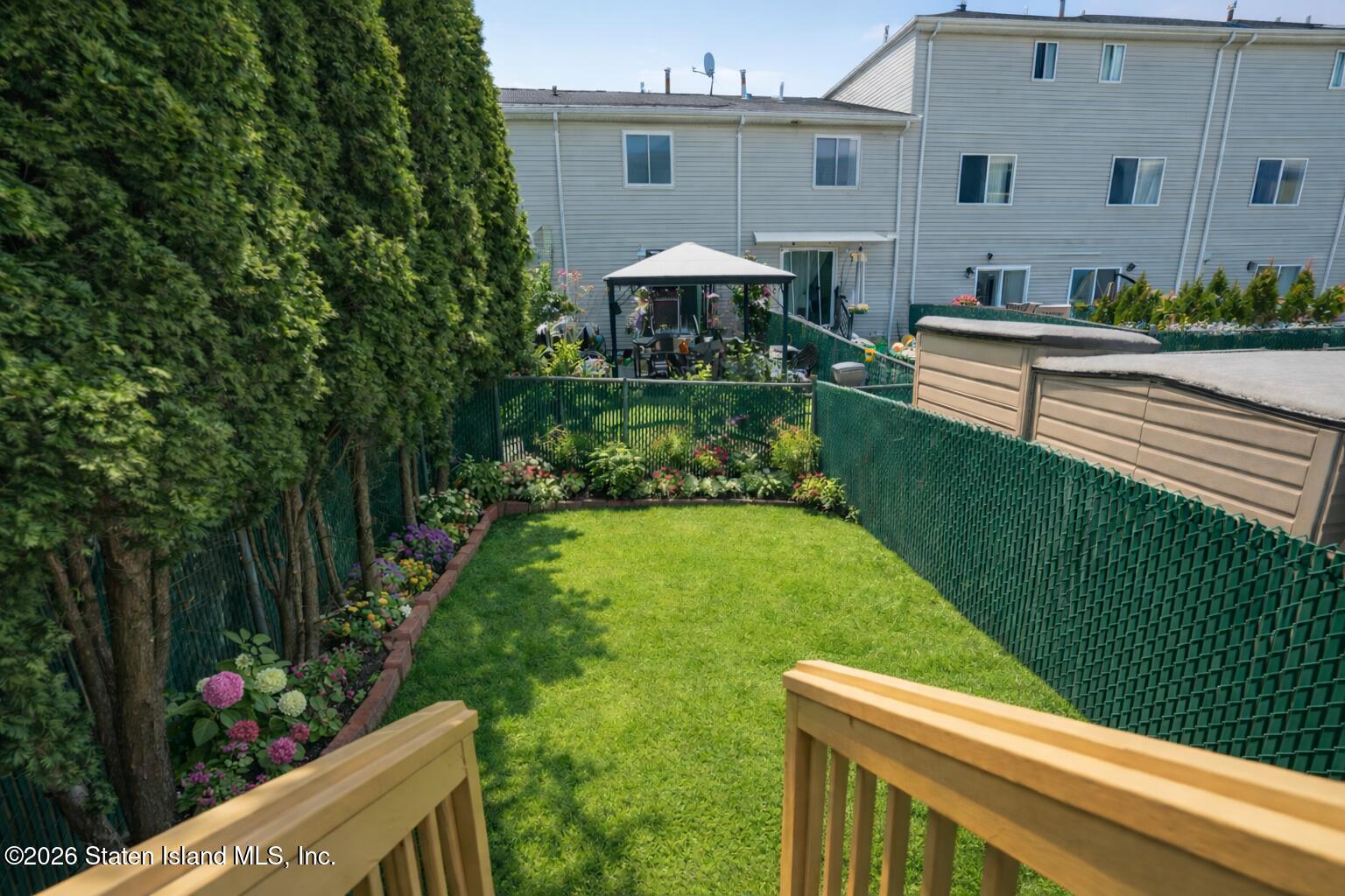 48 Studio Lane Staten Island, NY 10304 - Photo 38 of 38 a front view of a house with garden