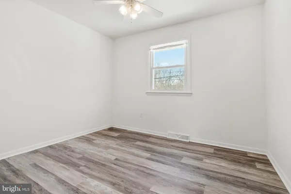 an empty room with a workspace