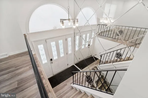 a view of entryway with wooden floor