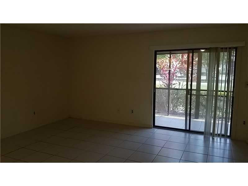 9709 West McNab Road, Unit 103 Tamarac, FL 33321 - Photo 3 of 9 Living Room