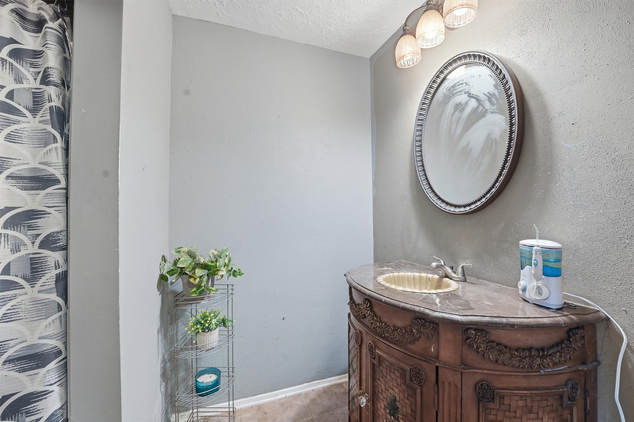 1322 Great Dover Circle Channelview, TX 77530 - Photo 13 of 19 a bathroom with a sink and a mirror