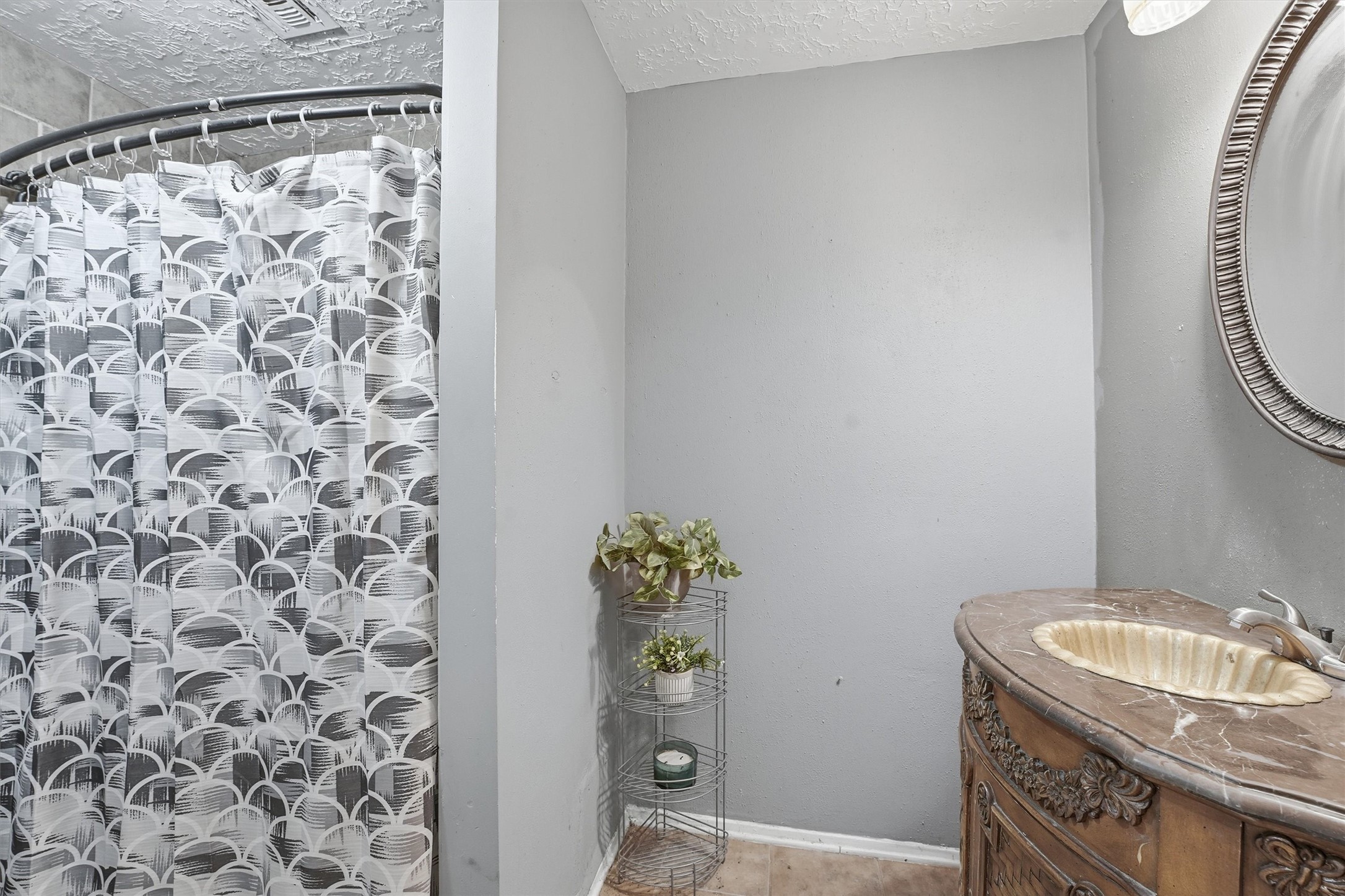 1322 Great Dover Circle Channelview, TX 77530 - Photo 14 of 19 a bathroom with a granite countertop sink and a mirror