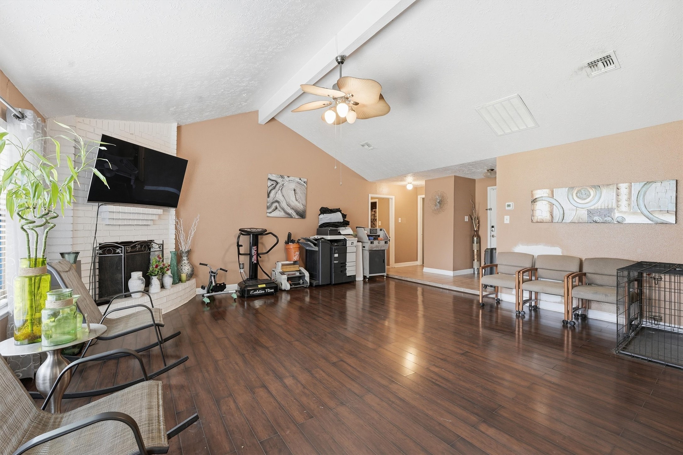 1322 Great Dover Circle Channelview, TX 77530 - Photo 4 of 19 a living room with furniture a fireplace and a flat screen tv