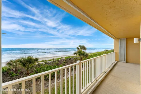 a view of a pathway both side of a house