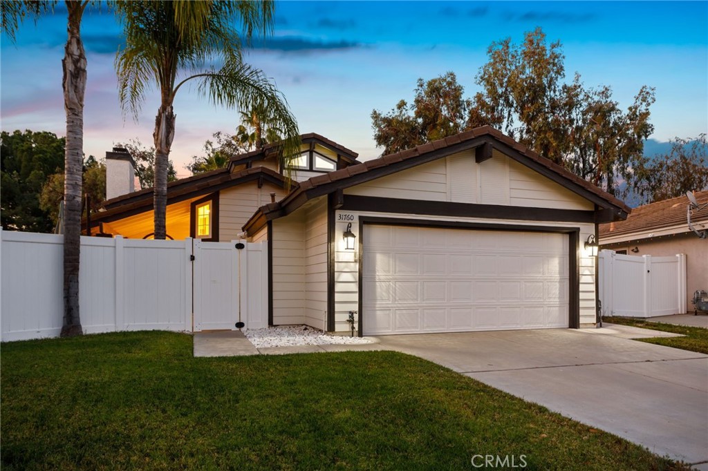 31760 Corte Tortosa Temecula, CA 92592 - Photo 1 of 46 a front view of house with yard