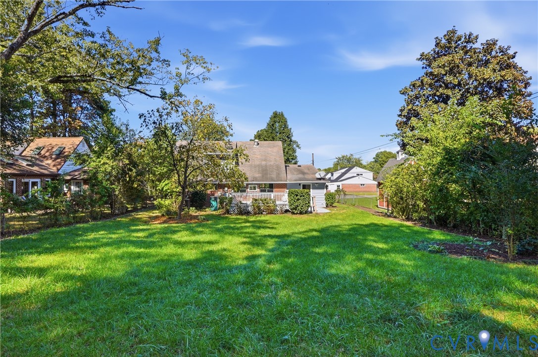 9207 Mapleway Road Richmond, VA 23229 - Photo 35 of 36 Expansive green lawn with mature trees and establi