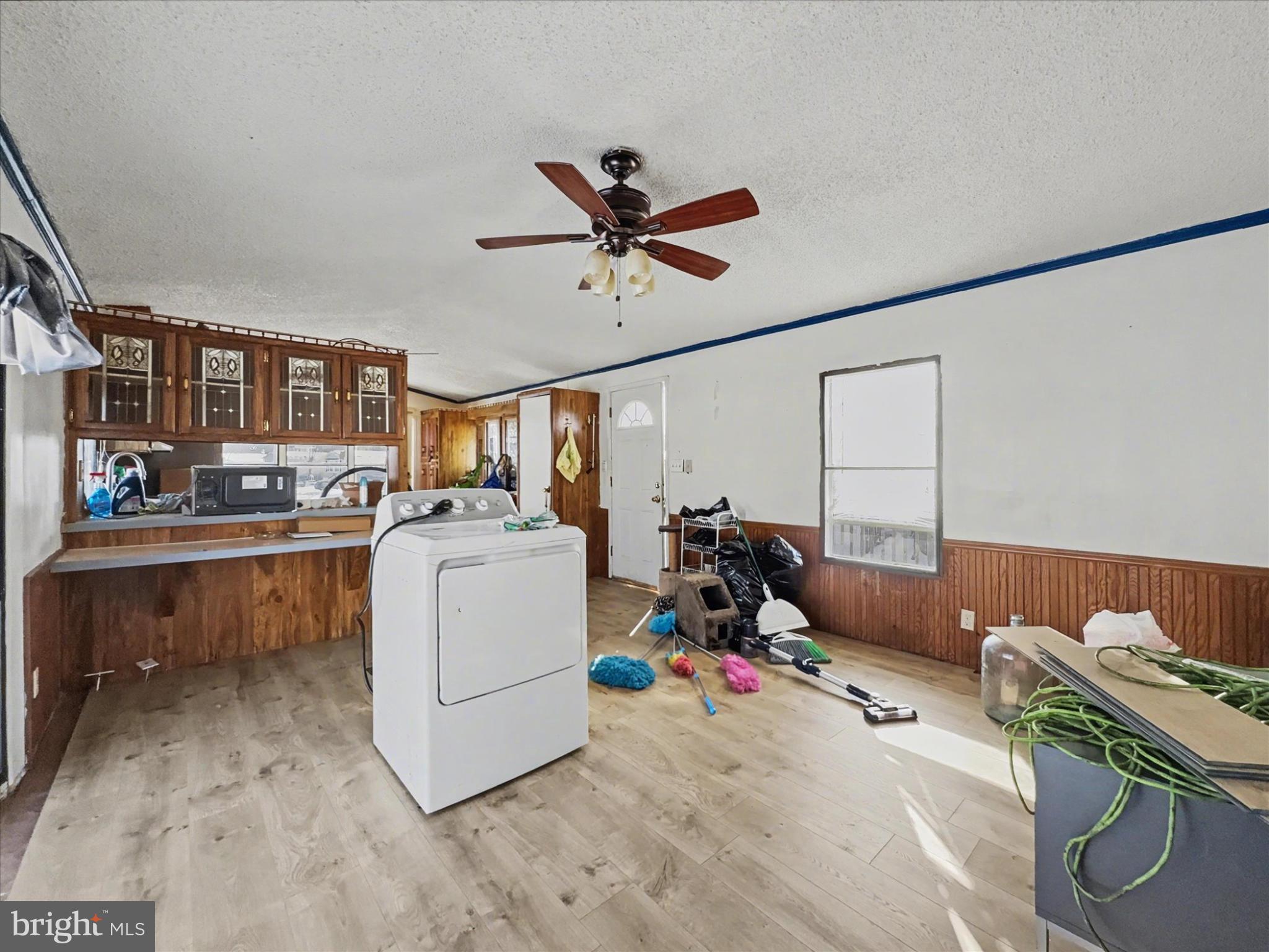 126 Roundup Road Baltimore, MD 21220 - Photo 10 of 14 Spacious laundry area with rustic charm.