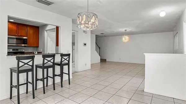 a view of a dining room with furniture