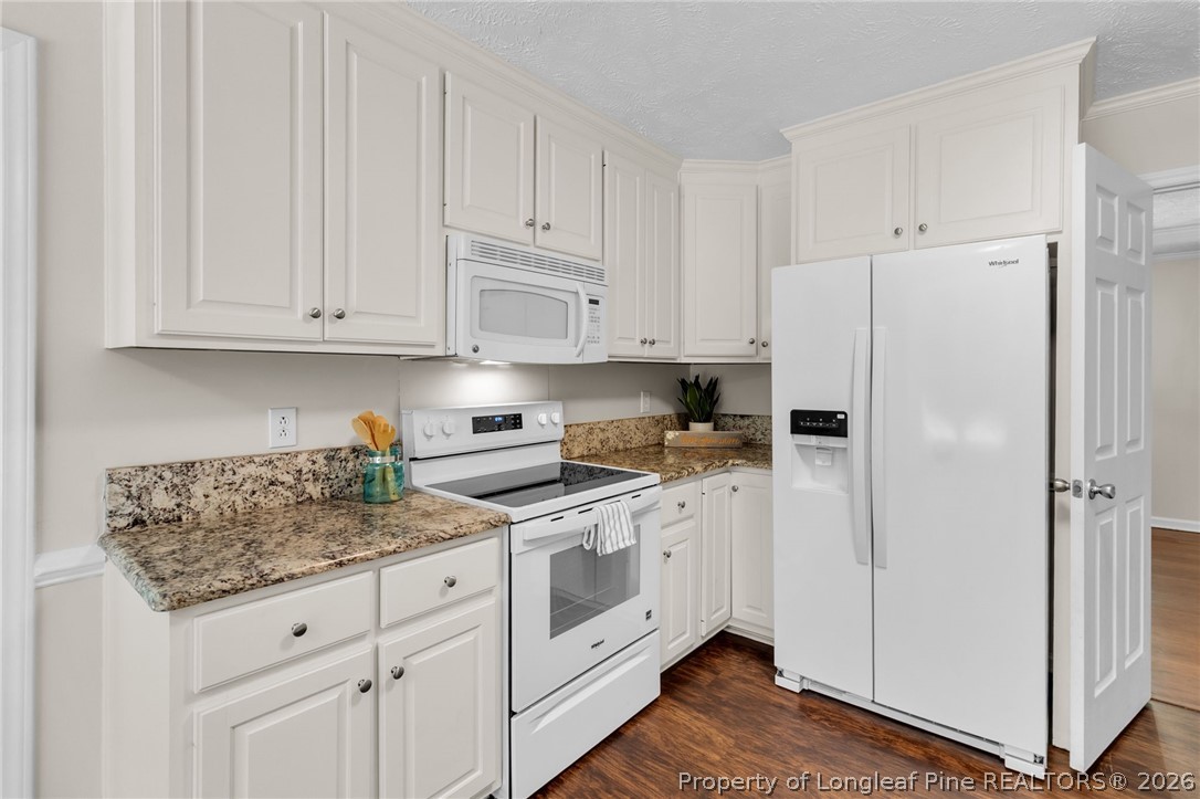 7837 Shuttle Road Fayetteville, NC 28311 - Photo 15 of 49 New white range and refrigerator