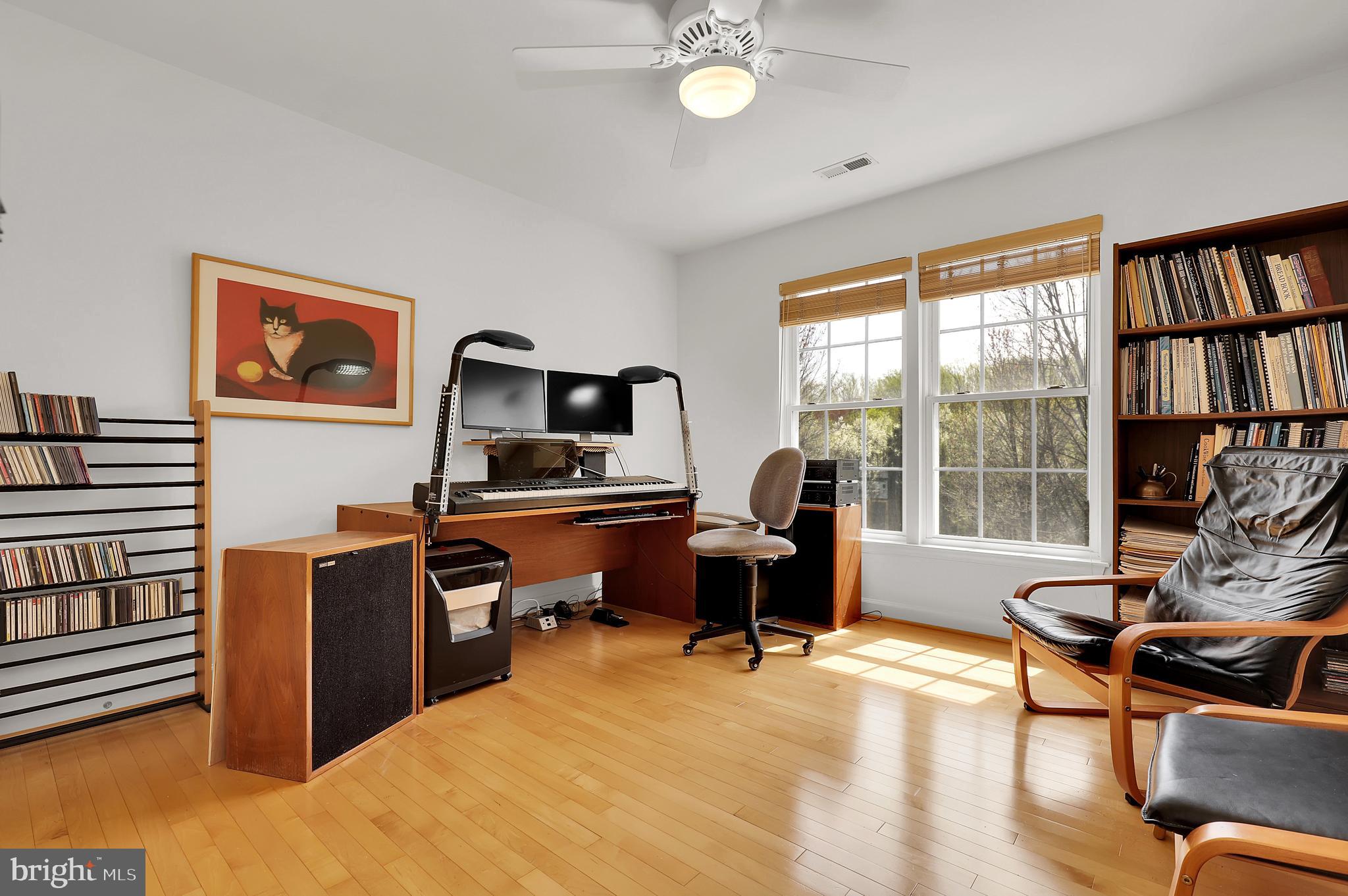 3006 Novak Terrace Burtonsville, MD 20866 - Photo 23 of 71 a view of a workspace with furniture and a window