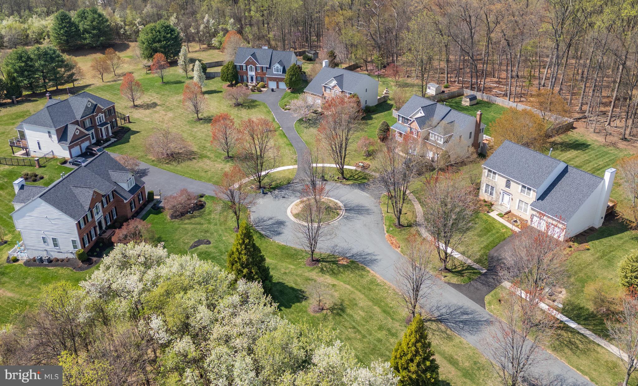 3006 Novak Terrace Burtonsville, MD 20866 - Photo 60 of 71 an aerial view of residential houses with outdoor space
