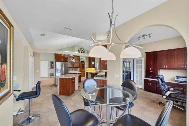a living room with fireplace furniture and a wooden floor