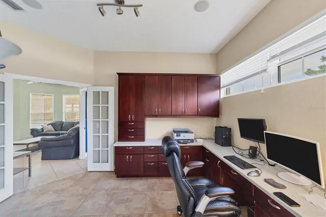 a view of a workspace with furniture