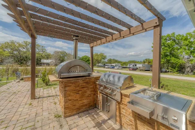 a view of a two chairs in the balcony
