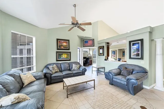 a living room with furniture or couch and a window