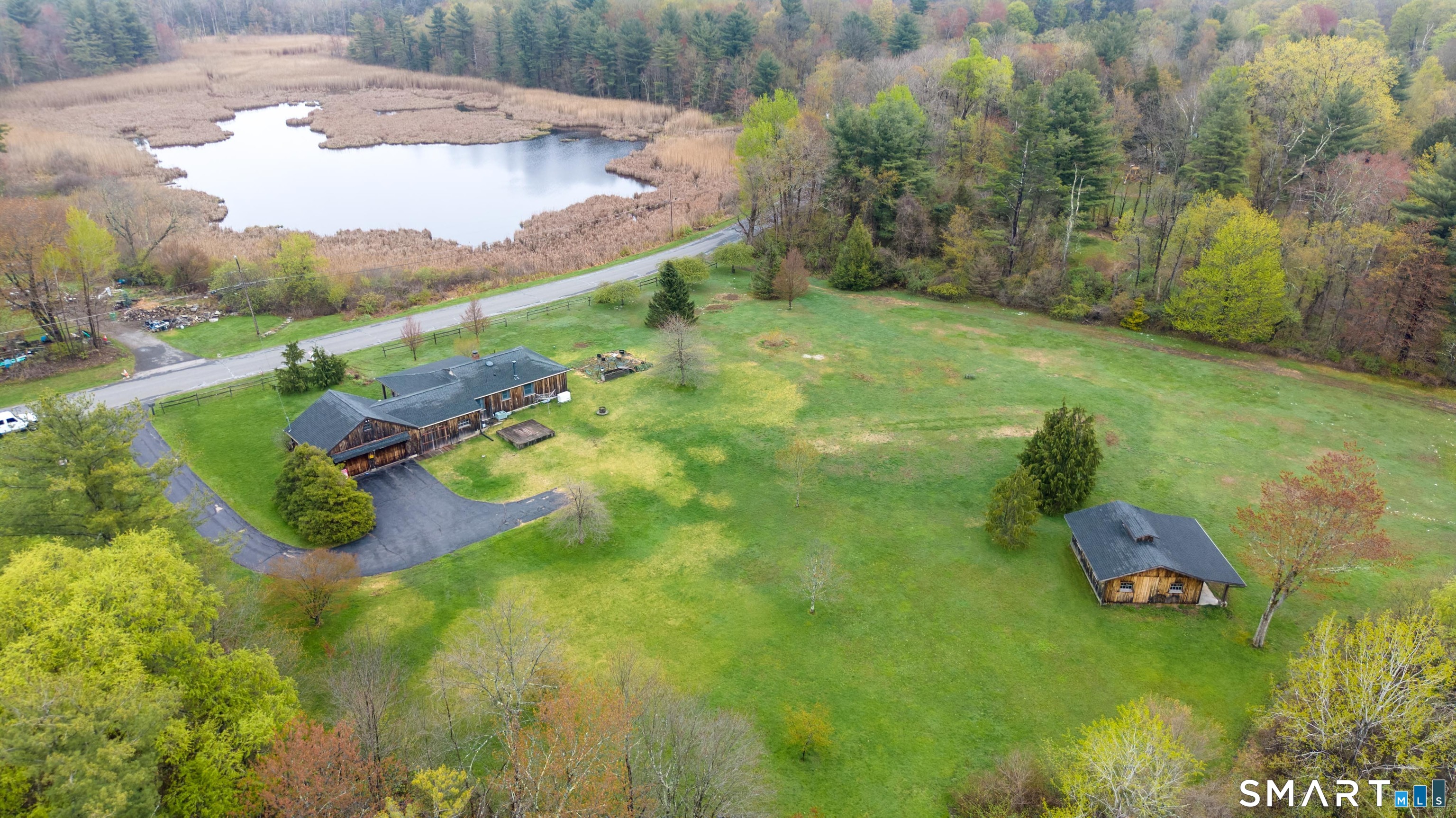 139 West Side Road Goshen, CT 06756 - Photo 2 of 17 a view of a backyard
