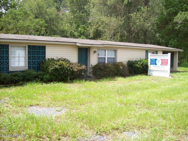 904 New Berlin Road Jacksonville, FL 32218 - Photo 1 of 19 a view of a house with garden and yard