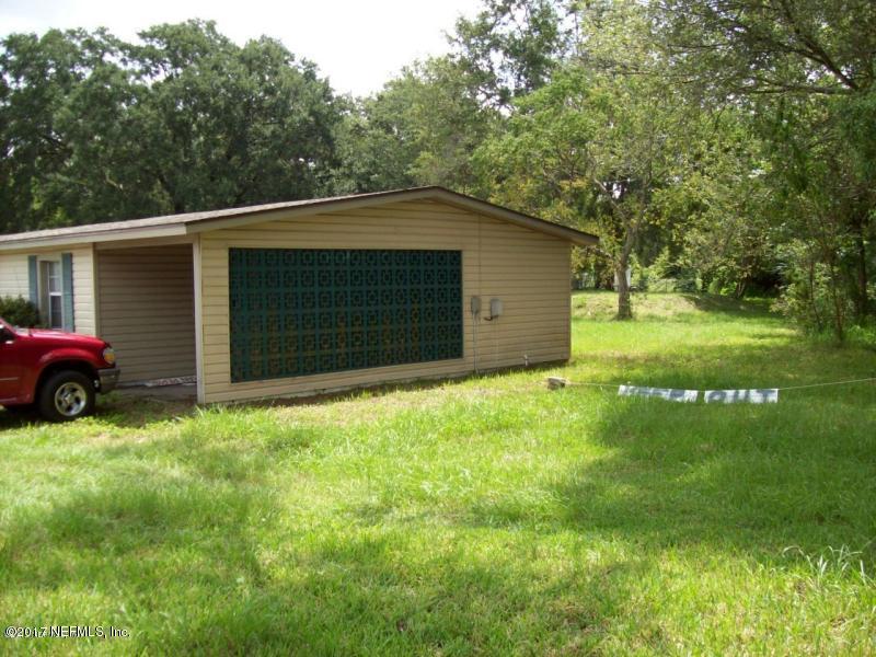 904 New Berlin Road Jacksonville, FL 32218 - Photo 13 of 19 a view of a backyard