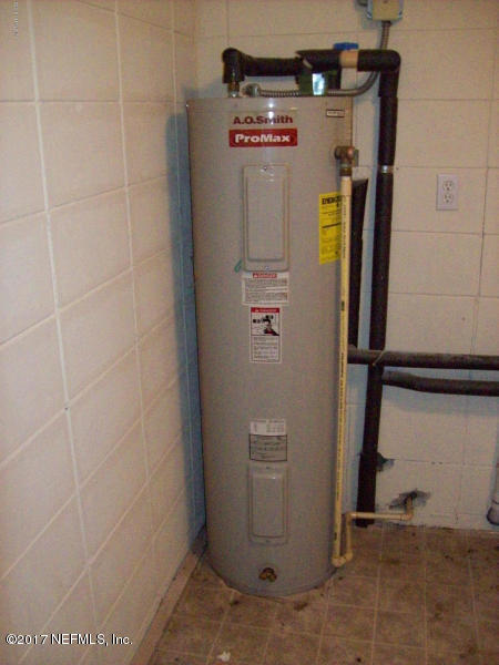 904 New Berlin Road Jacksonville, FL 32218 - Photo 8 of 19 a view of water heater room