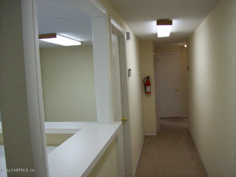 904 New Berlin Road Jacksonville, FL 32218 - Photo 9 of 19 a bathroom with a bathtub and shower