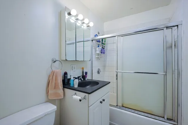 a bathroom with a sink and mirror